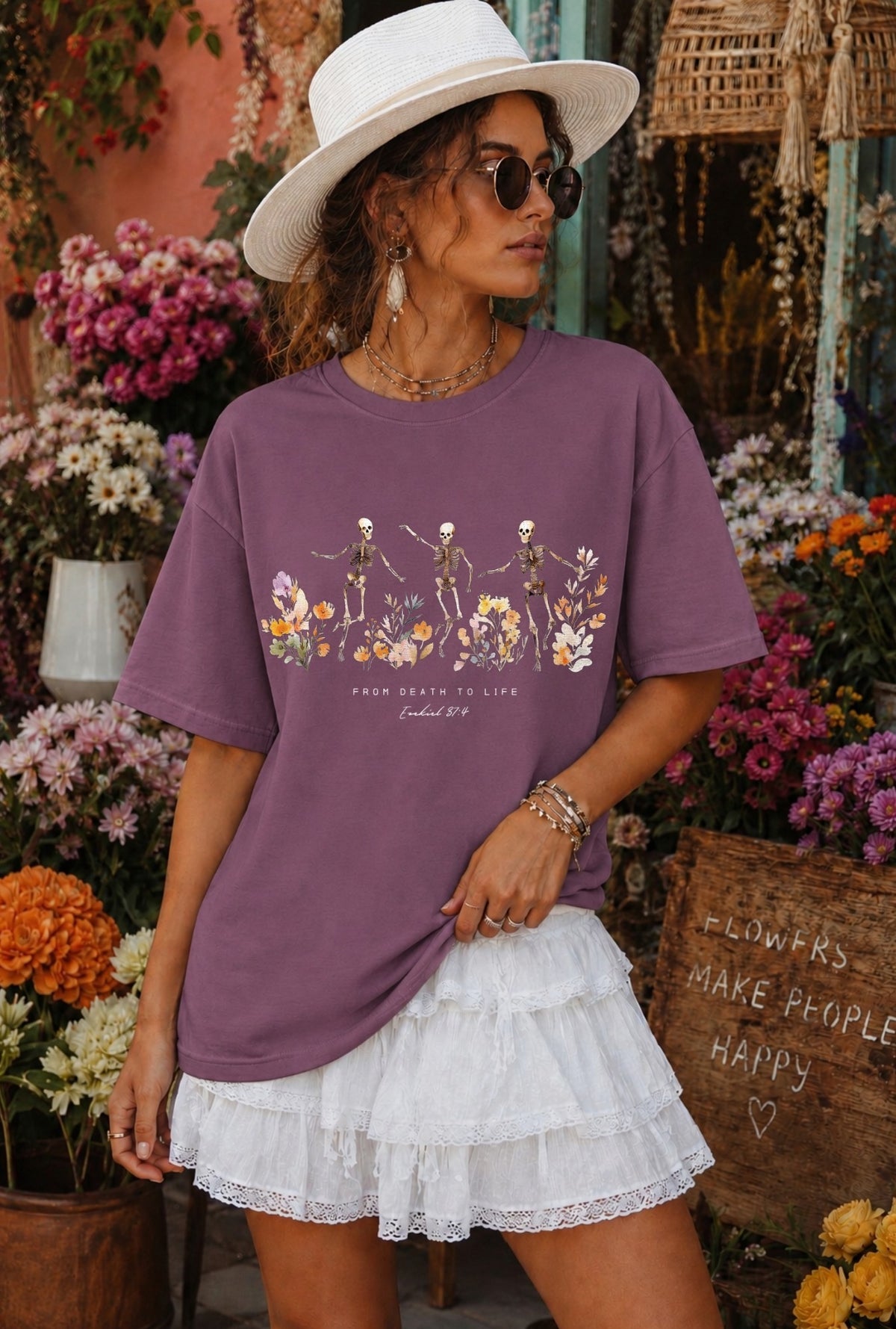 Model wearing oversized dusty mauve From Death to Life graphic tee with Ezekiel 37:4 scripture design